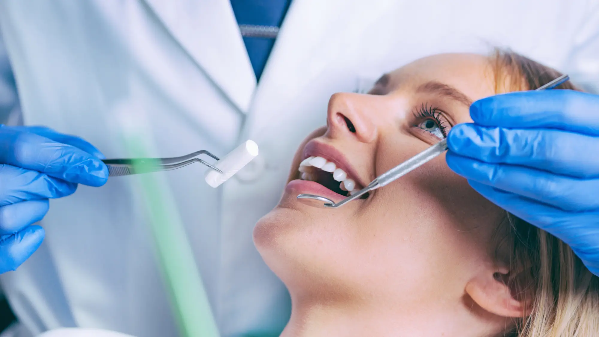 patient getting teeth cleaned
