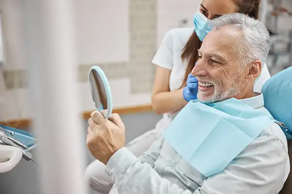 patient looking at self in mirror