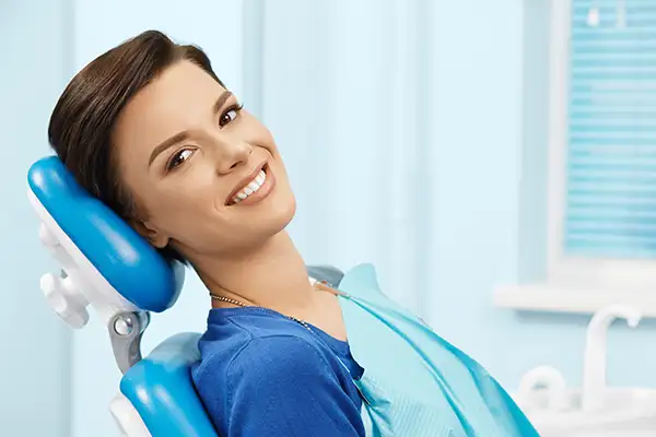 patient smiling in chair