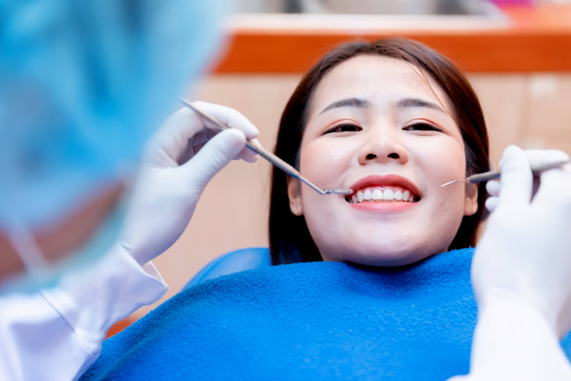 woman advocates wellness dentistry norfolk