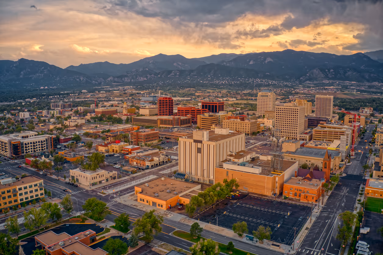 image of colorado springs cityscape at sunset (for a real estate broker)