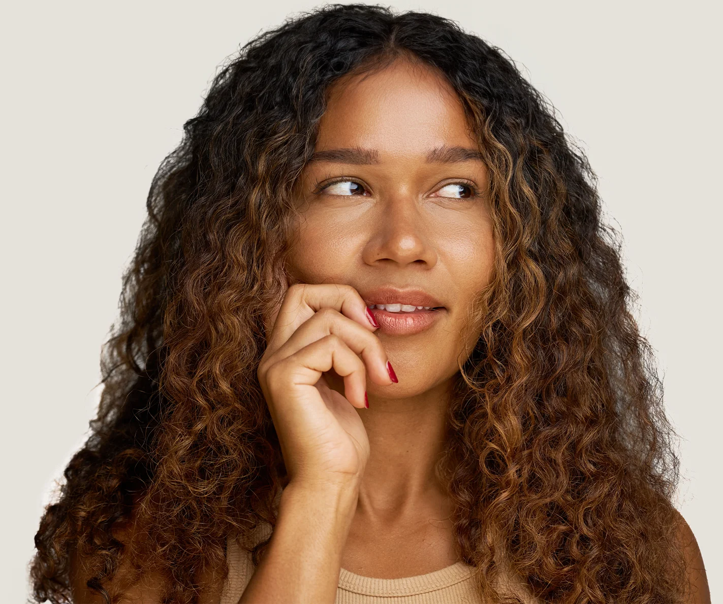 Young woman with full, balanced looking lips that accentuate her facial symmetry. 