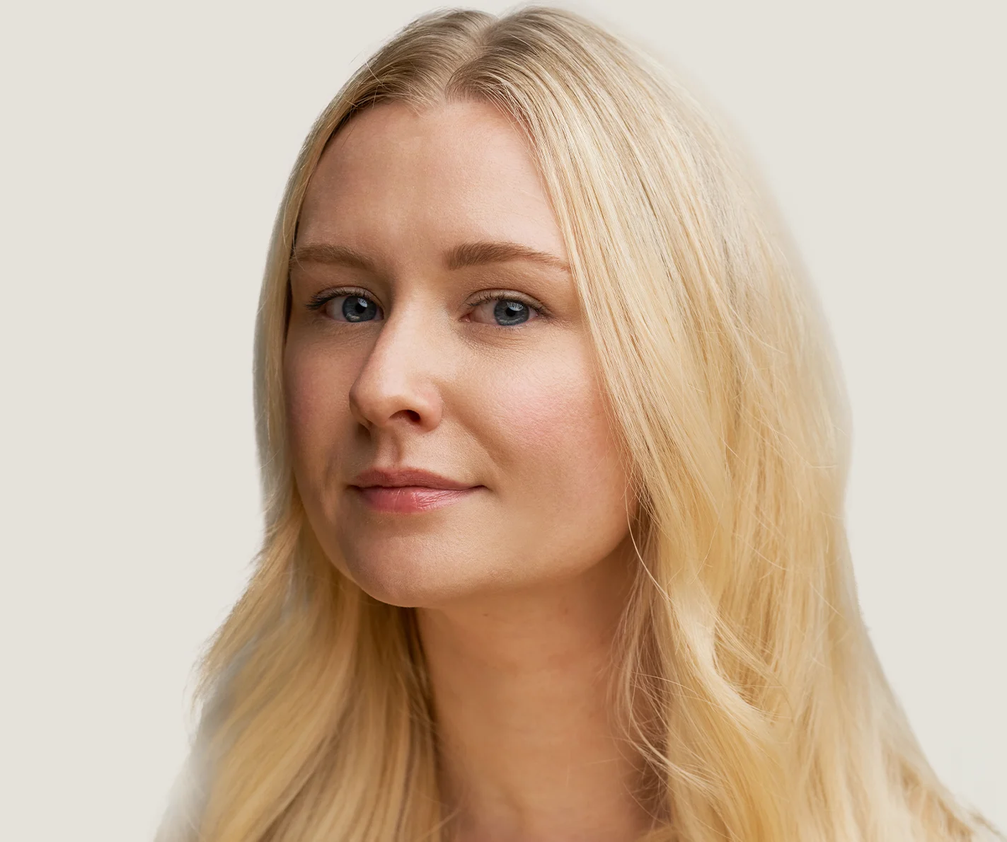 Young woman with clear skin that is free of inflammatory acne breakouts. 