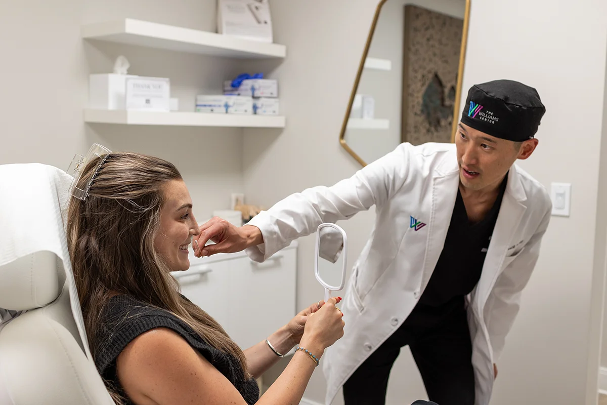 Young woman consulting with Dr. Daniel Lee for concerns about her lips.
