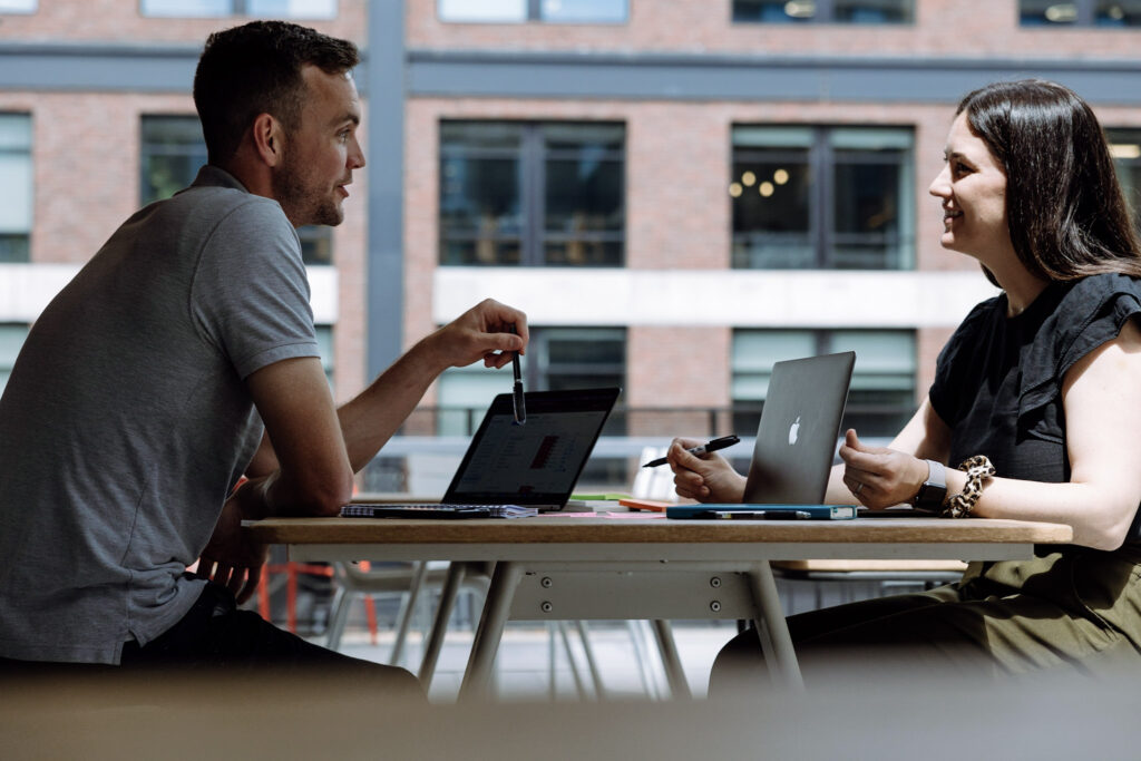 Friday team members chat casually 