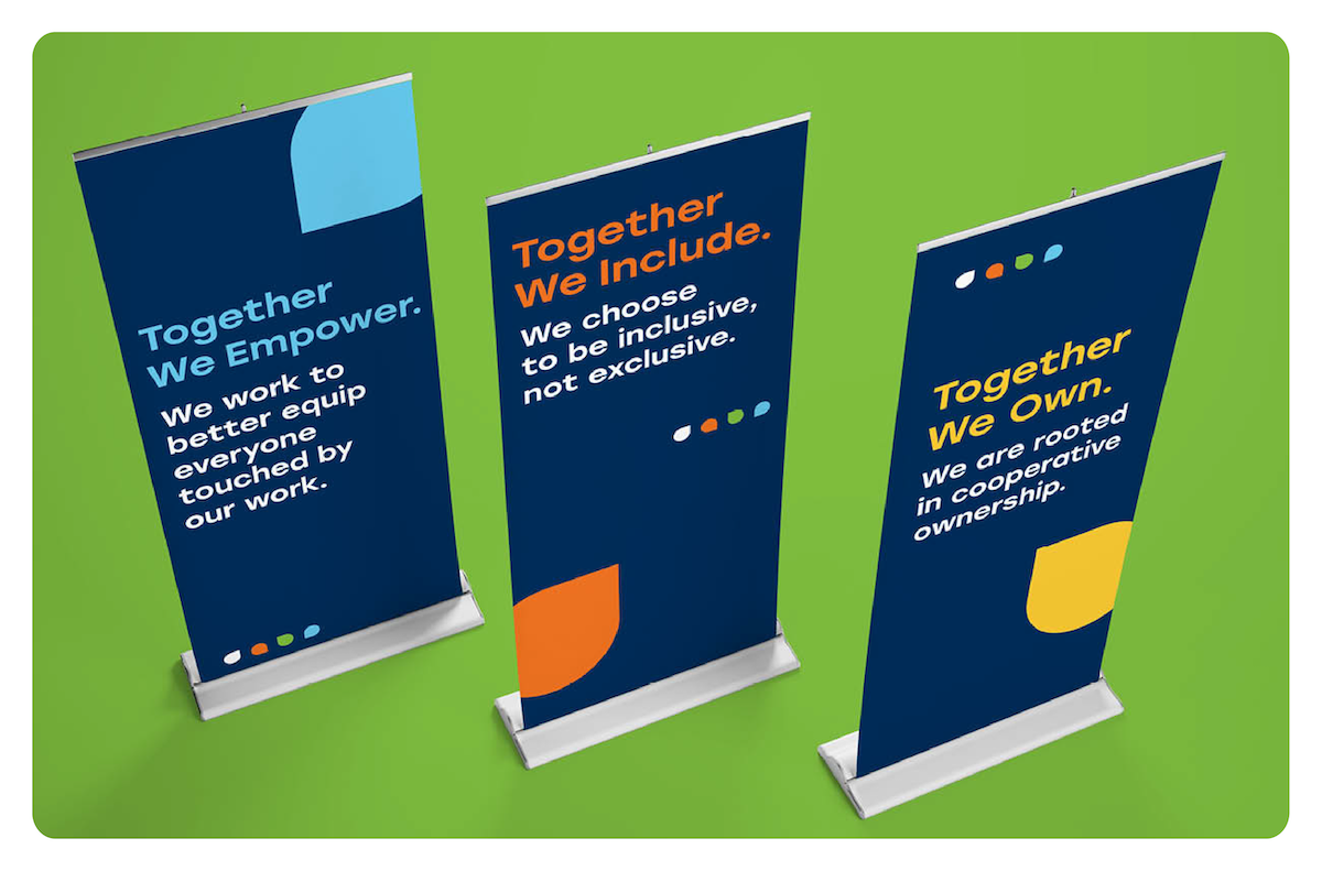 Designed banners with Clearwater Credit Union's values: Together we empower, Together we include, Together we own.
