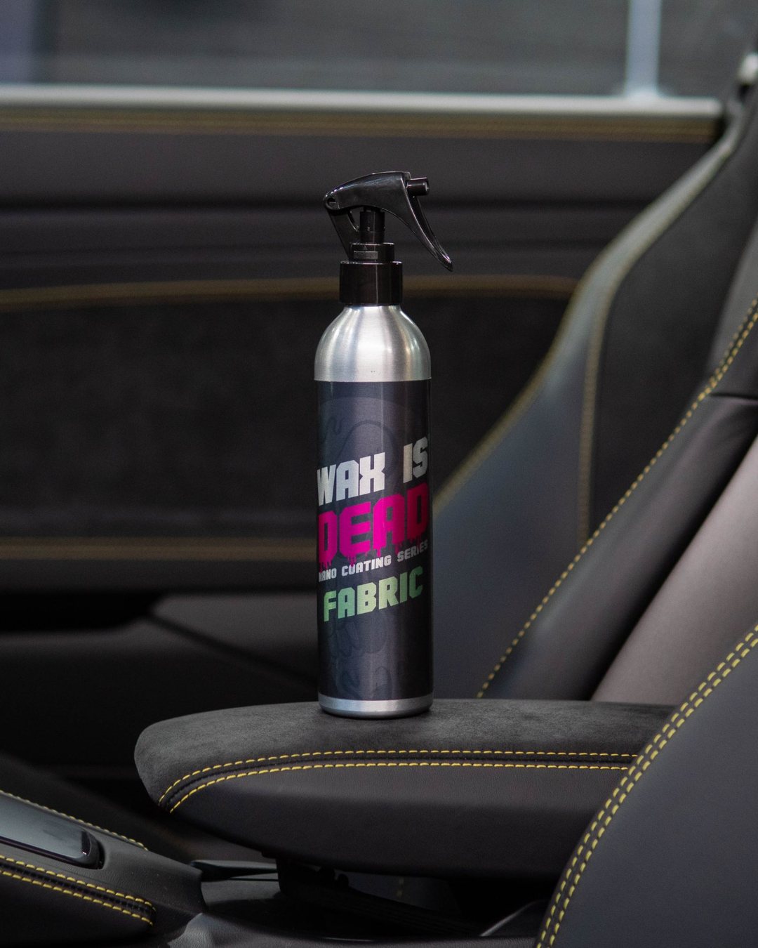 WID Fabric coating on a suede armrest between sports seats