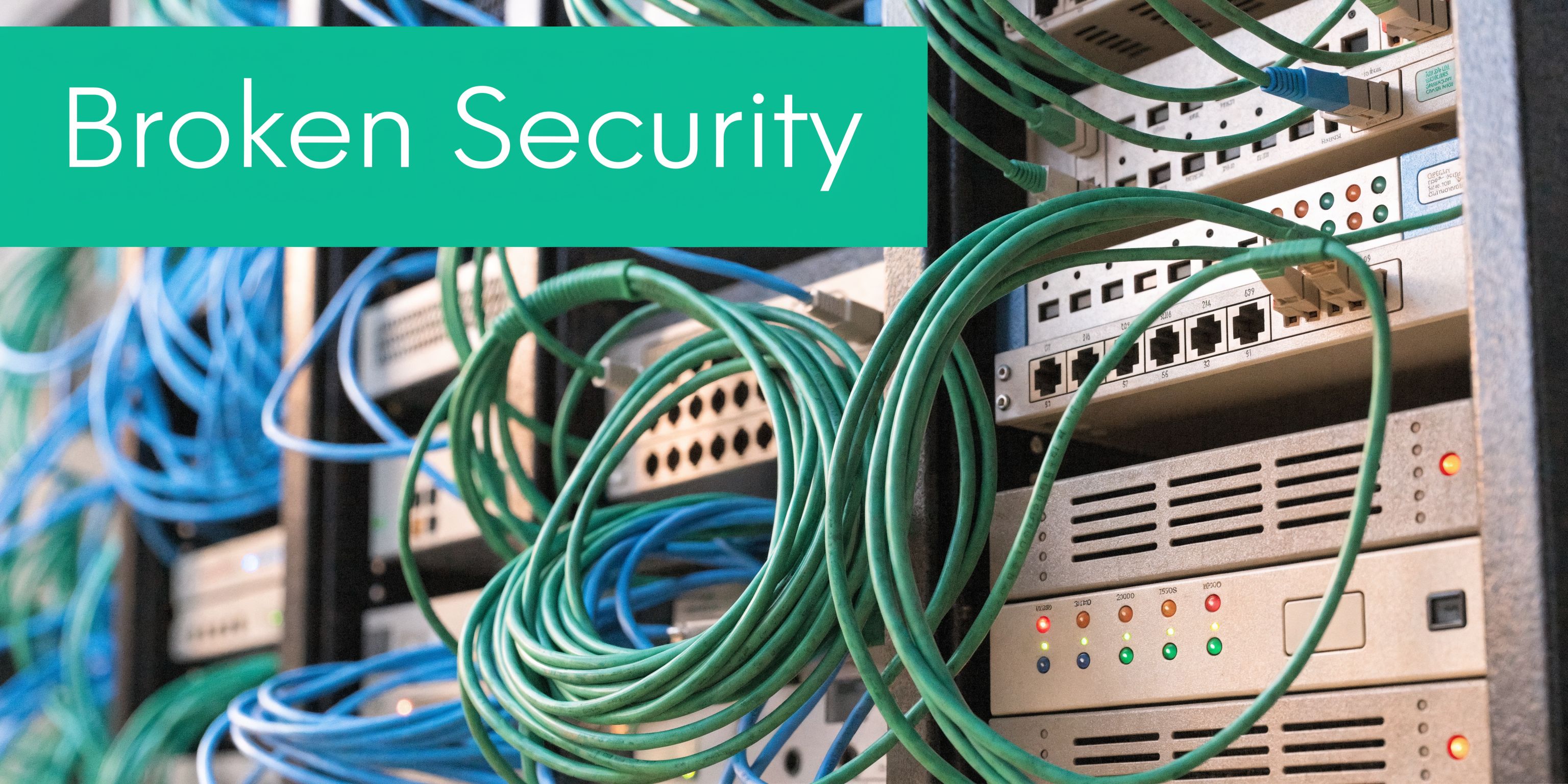 A close up of server rack hardware with tangled green and blue ethernet cables and networking ports.