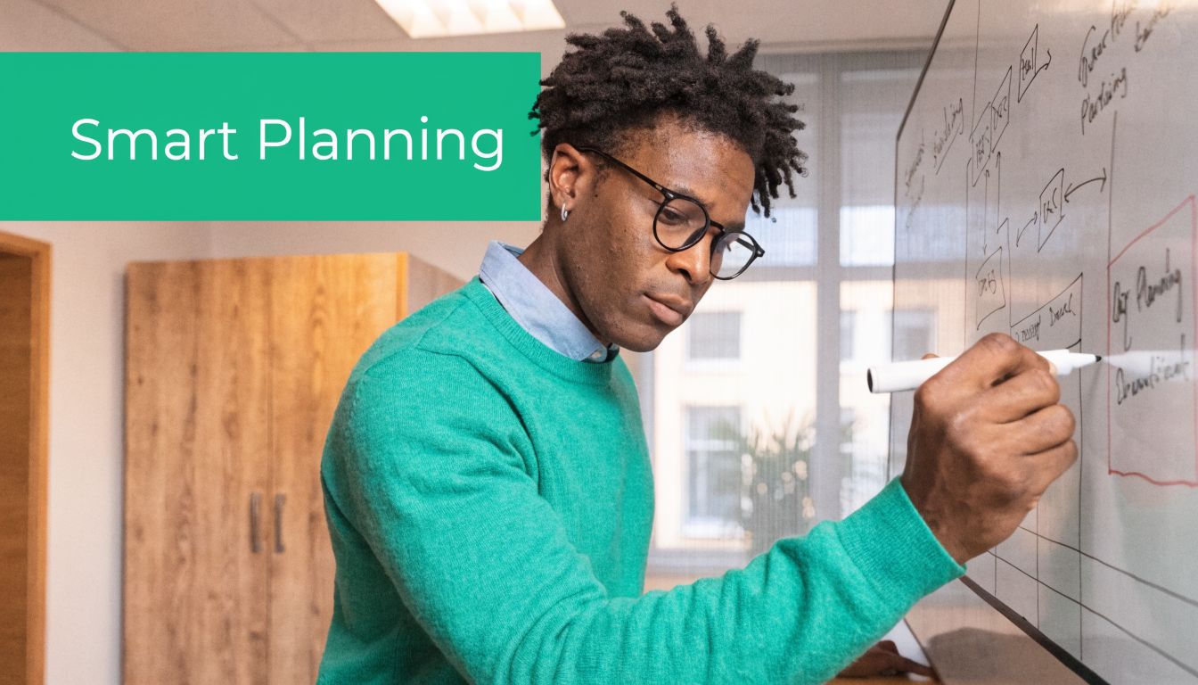 A professional man with glasses writing on a whiteboard to perform a cloud security assessment plan.