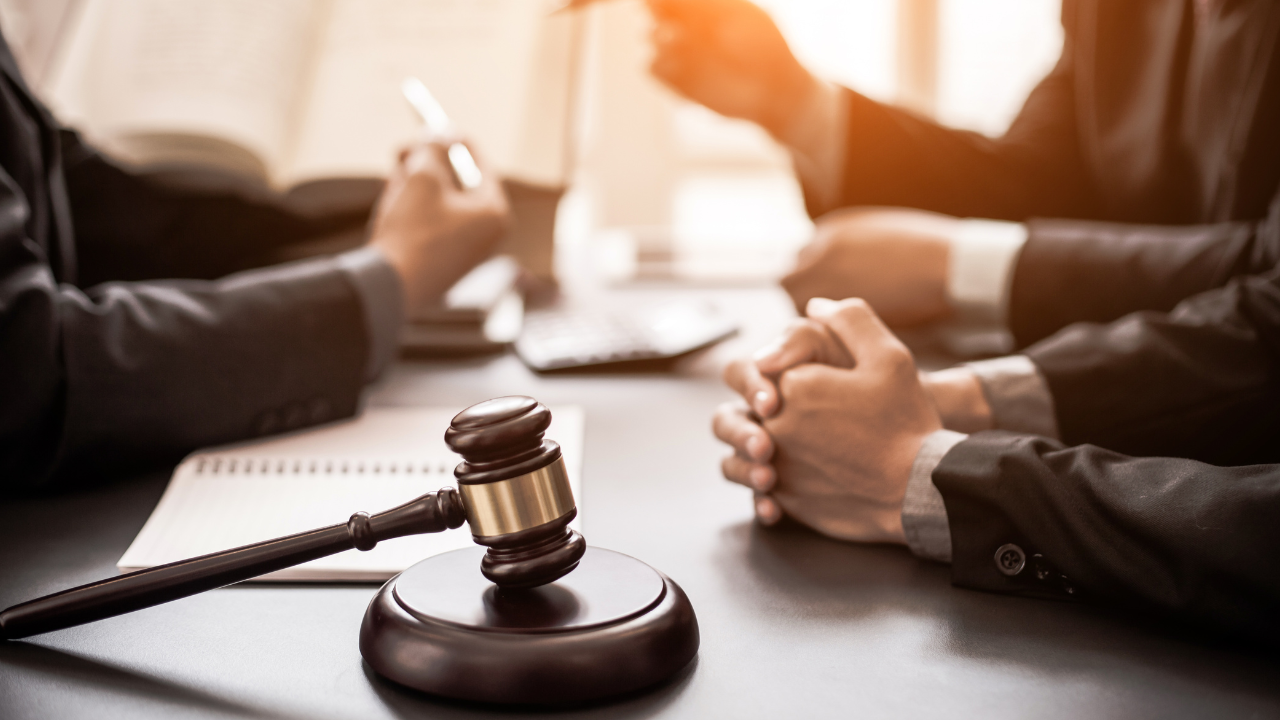 judges on a meeting with a hammer