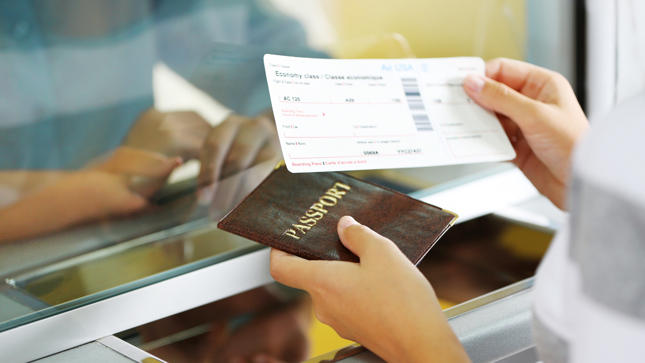 a woman holding a passport