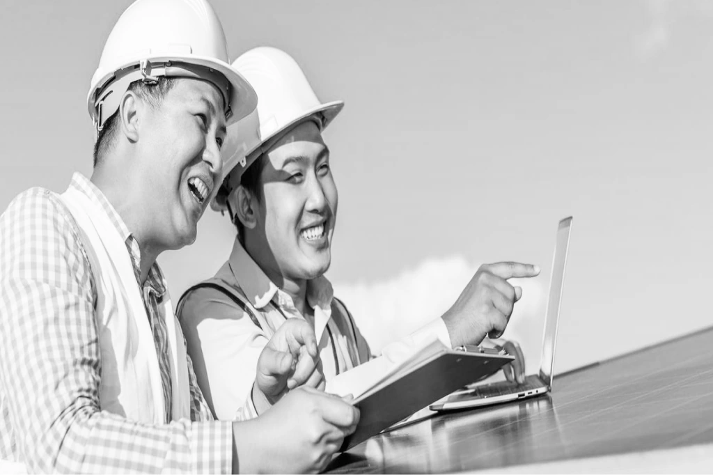 Engineers reviewing plans together