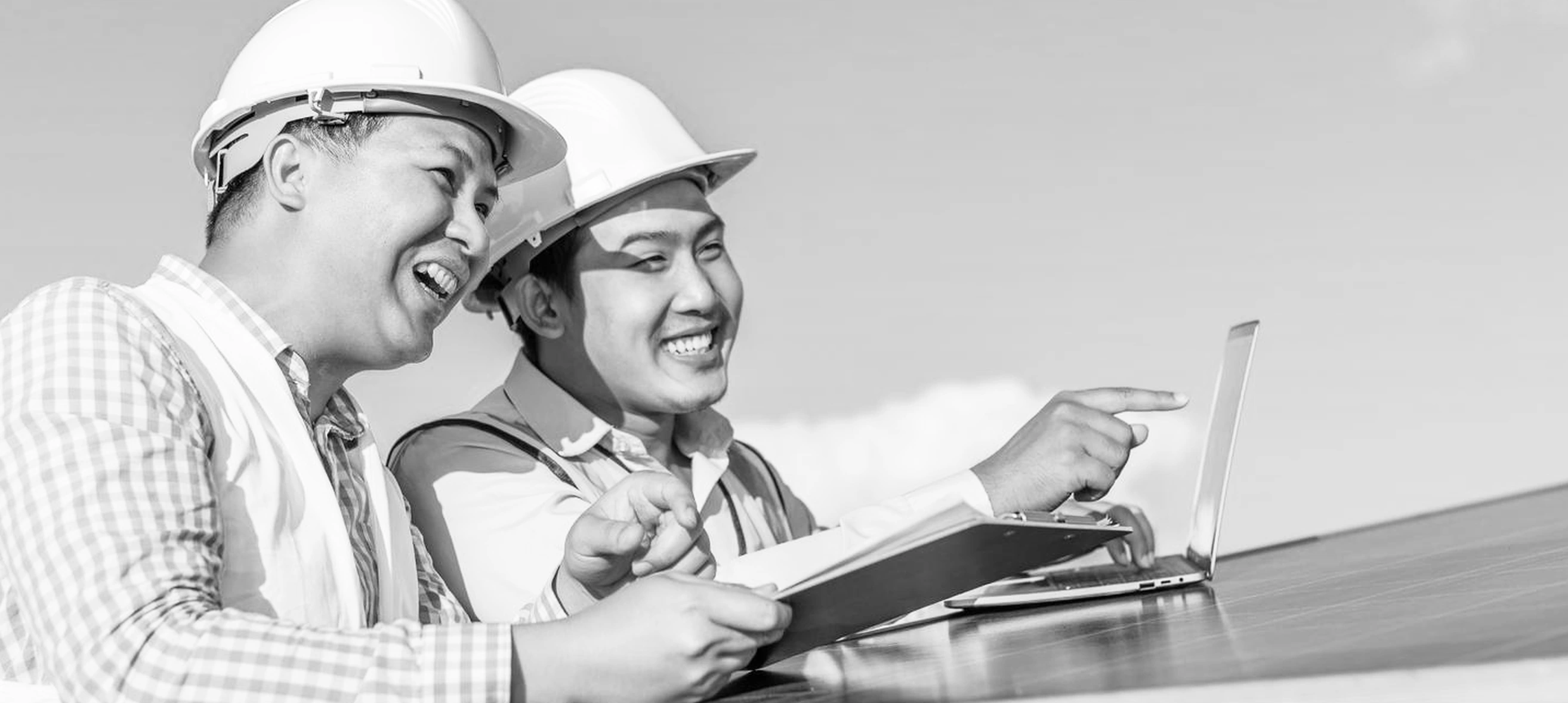 Engineers reviewing plans together