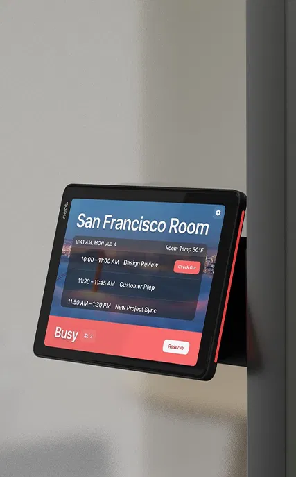 Écran numérique affichant l'emploi du temps de la salle San Francisco, indiquant trois réunions programmées et le statut occupé.