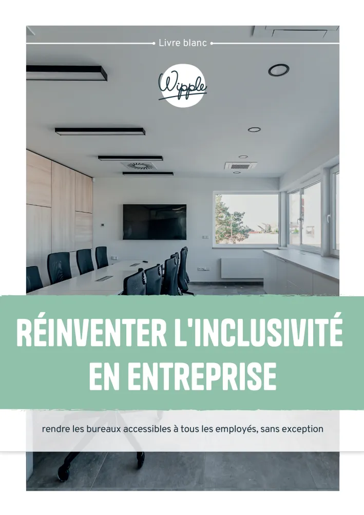 Salle de réunion moderne avec grandes fenêtres et chaises noires autour d'une table blanche, texte sur l'inclusivité en entreprise.