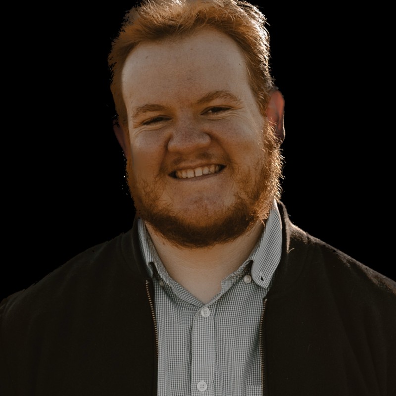 [headshot] image of a smiling customer (for a travel agency)