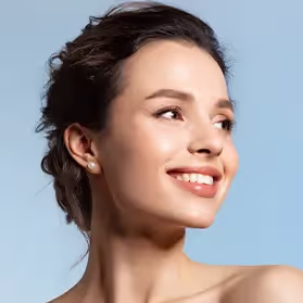 A close up of a woman with a smile on her face.