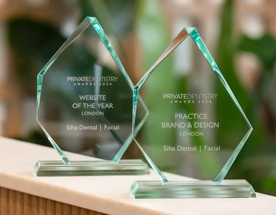 Two glass awards for Private Dentistry Awards 2024, one for Website of the Year London and the other for Practice Brand & Design London, both awarded to Siha Dental | Facial.