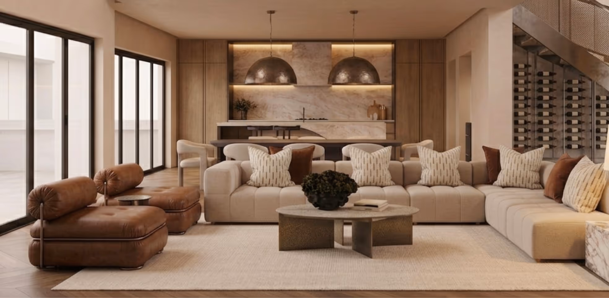 Modern living room with beige sectional sofa, brown chairs, coffee table, and kitchen area in background.