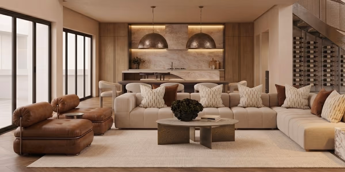 Modern living room with beige sectional sofa, brown leather chairs, marble coffee table, and large windows.
