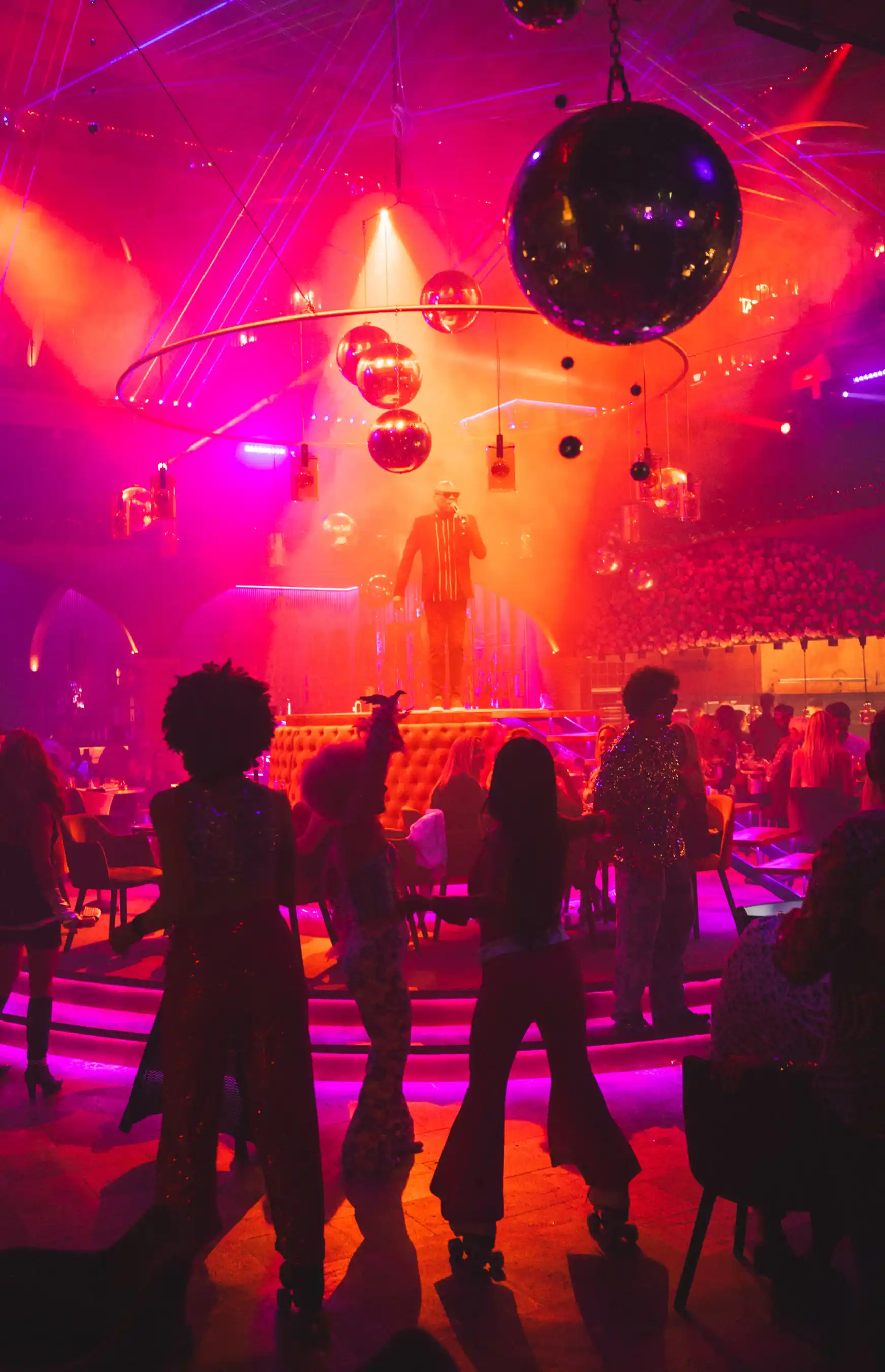 Friends dancing and celebrating during Night Fever at Tabana