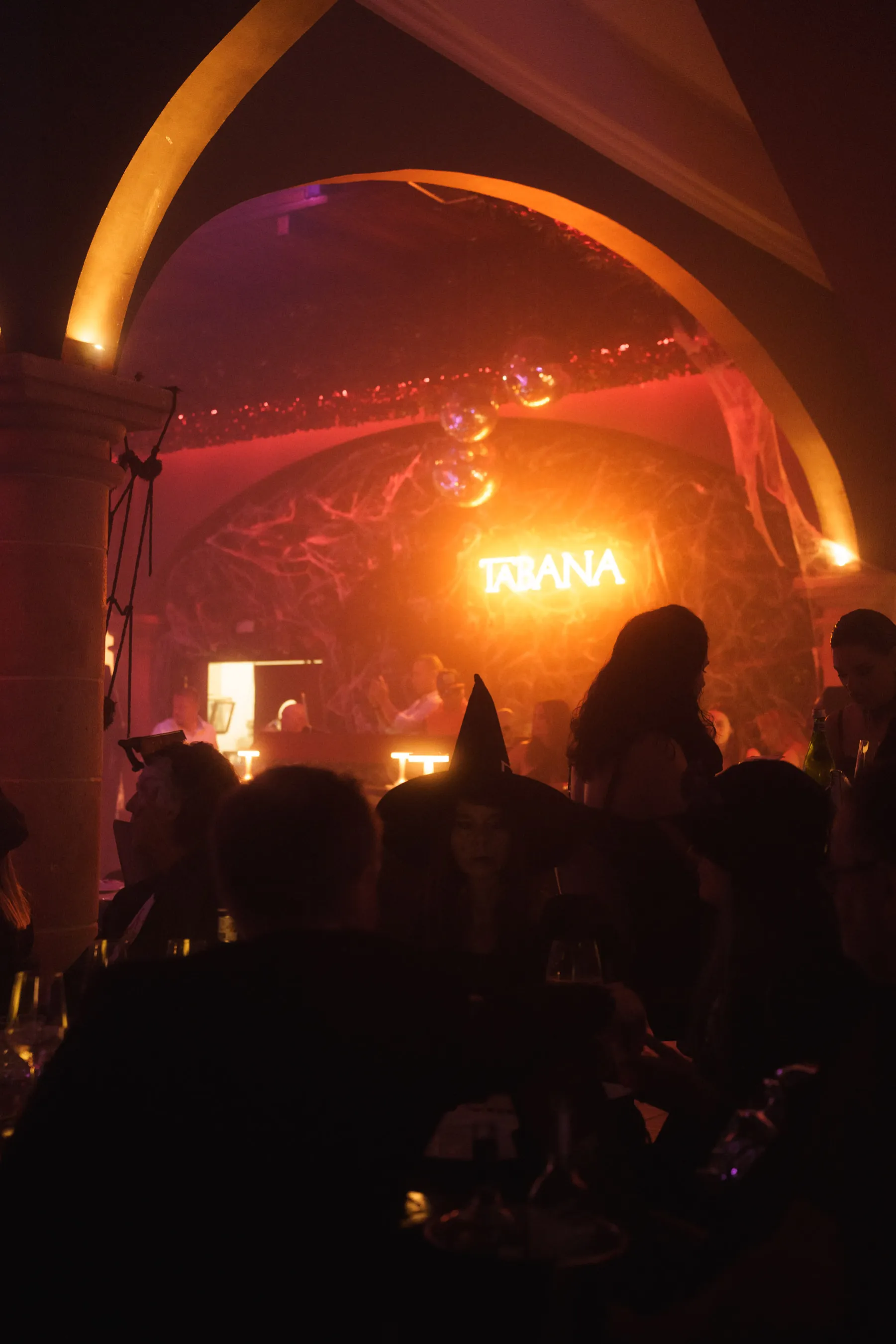 Overhead view of Halloween dining tables and party crowd at Tabana in Playa de Palma.