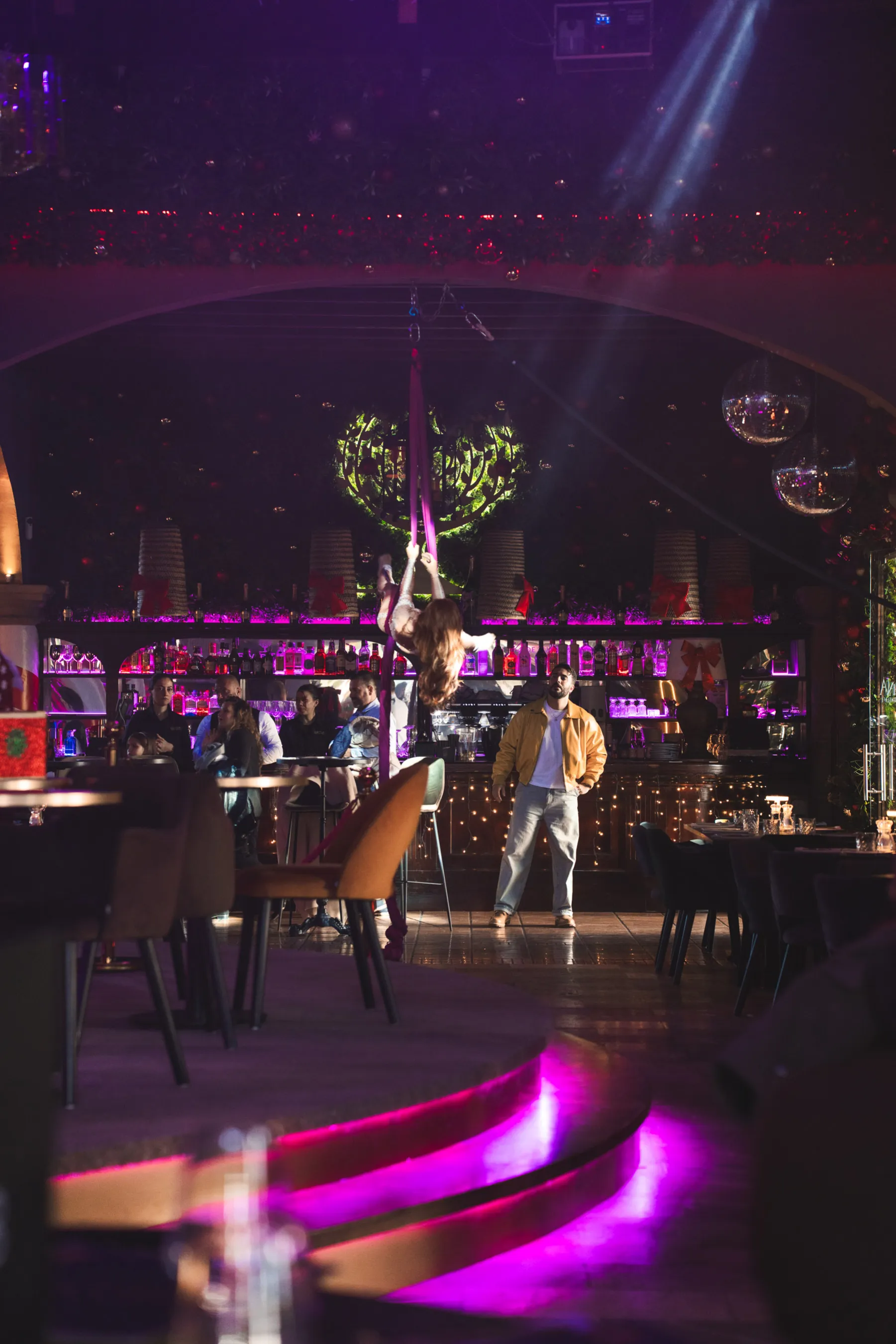 amilies seated together at Tabana Santa’s Lunch enjoying Christmas dining and entertainment.