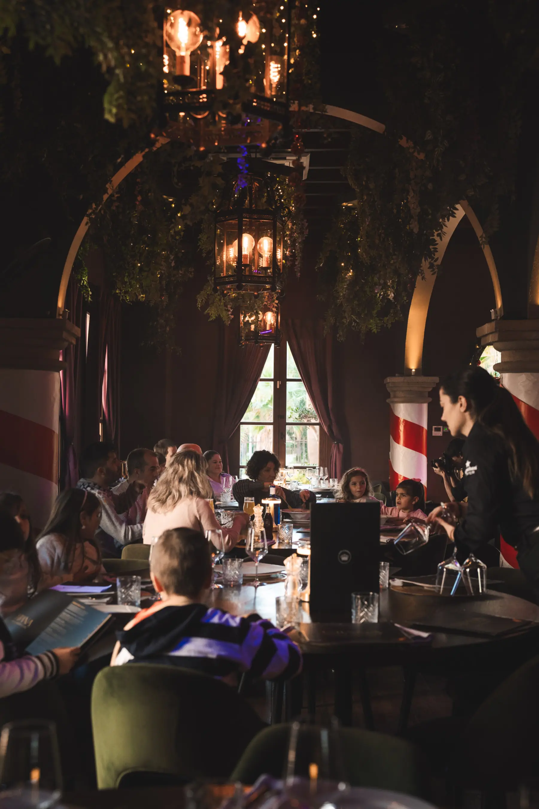 Festive dining room at Tabana Grill & Nightlife decorated for Christmas family lunch.