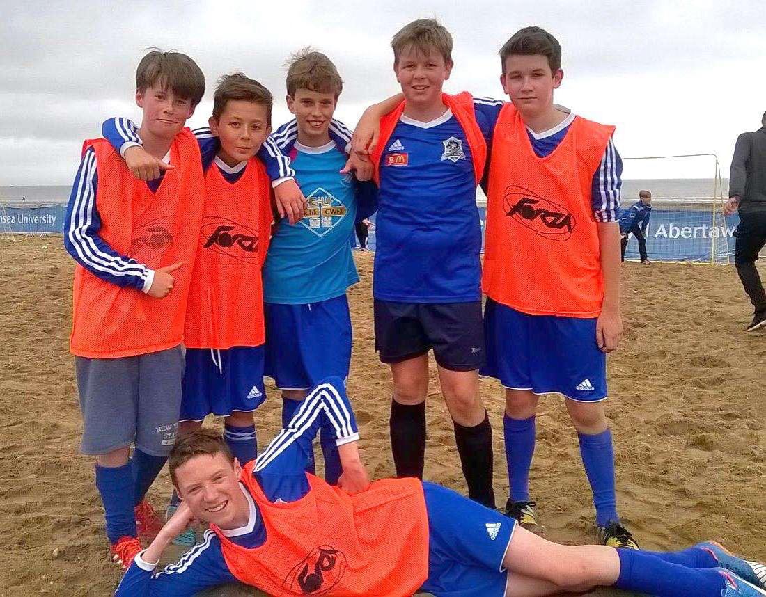 A young Phil with his team