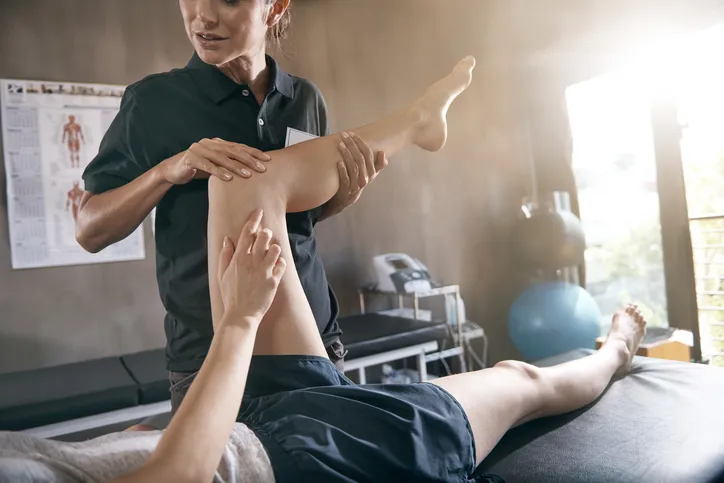 Physical therapists in rehabilitation therapy