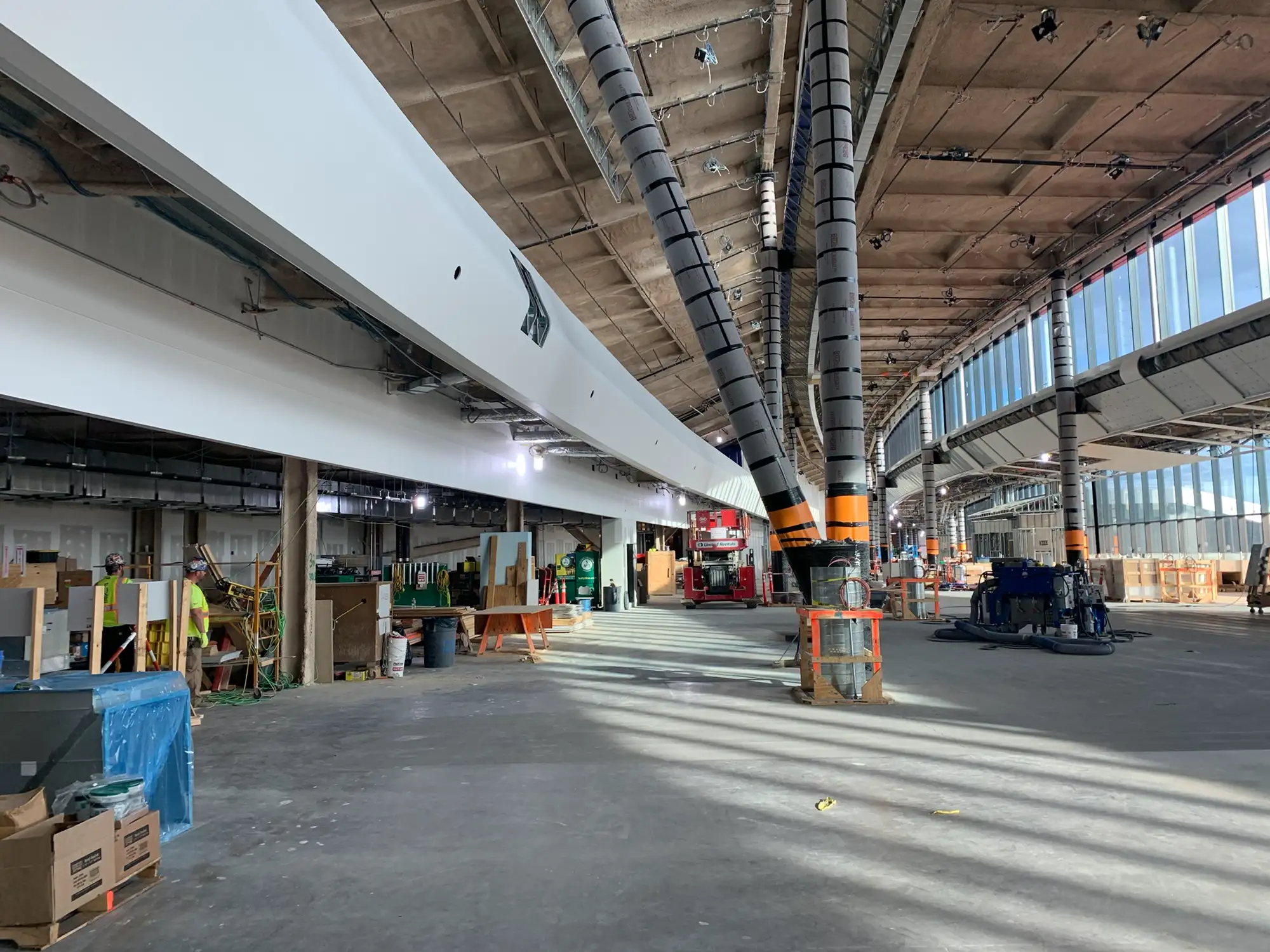 Interior concourse framing and ceiling system constructed with engineered cold formed steel panels at Logan Terminal D Boston