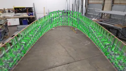 Assembled using augmented reality, these prefabricated curved canopy framing panel assembled in shop prior to installation at 10 World Trade Boston