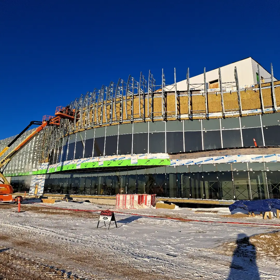 Install of the efficient curved truss system  for Cenovus Energy Hub with limited crew