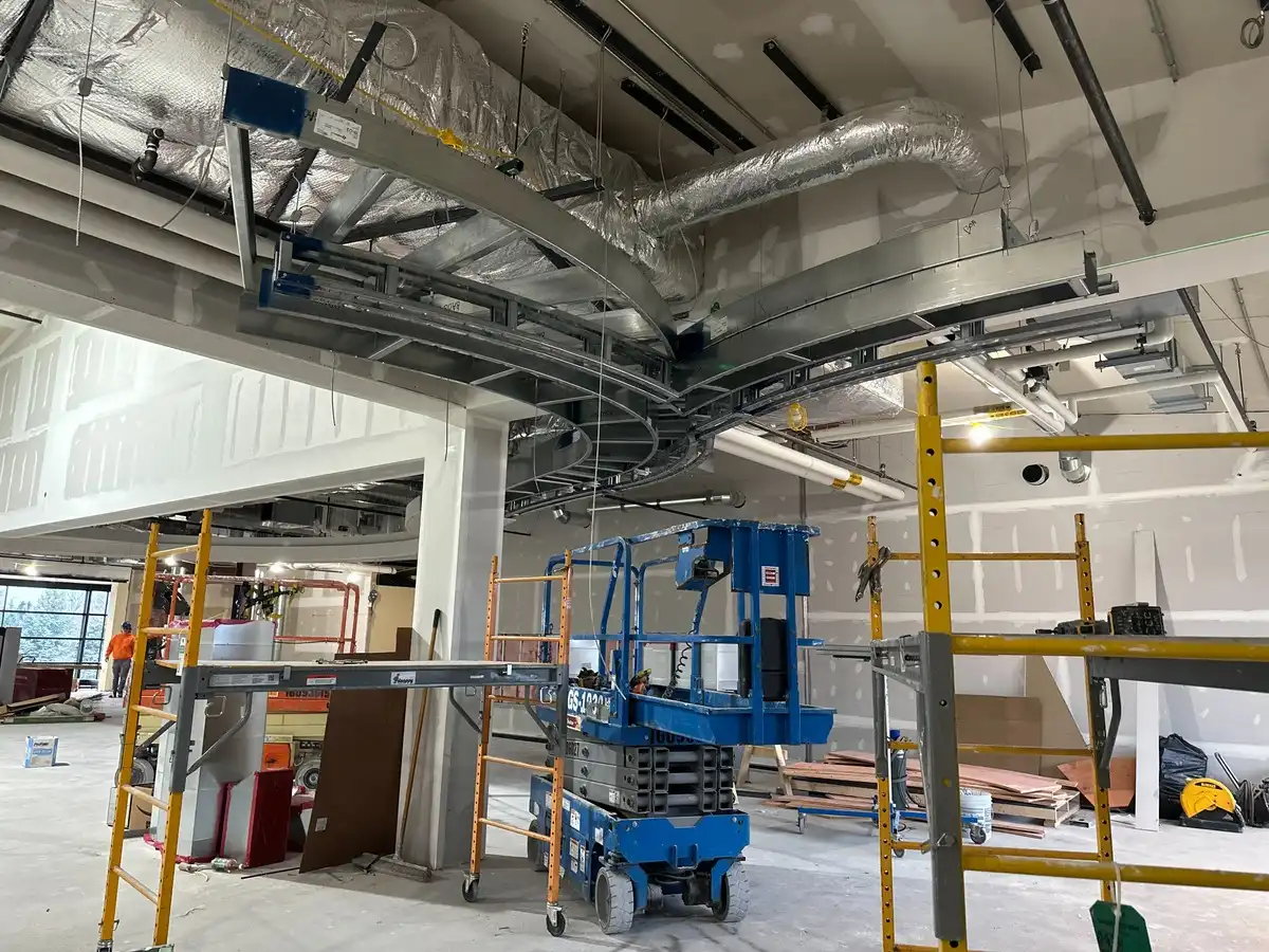 Light Gauge Metal soffit hung by economical wire hangers