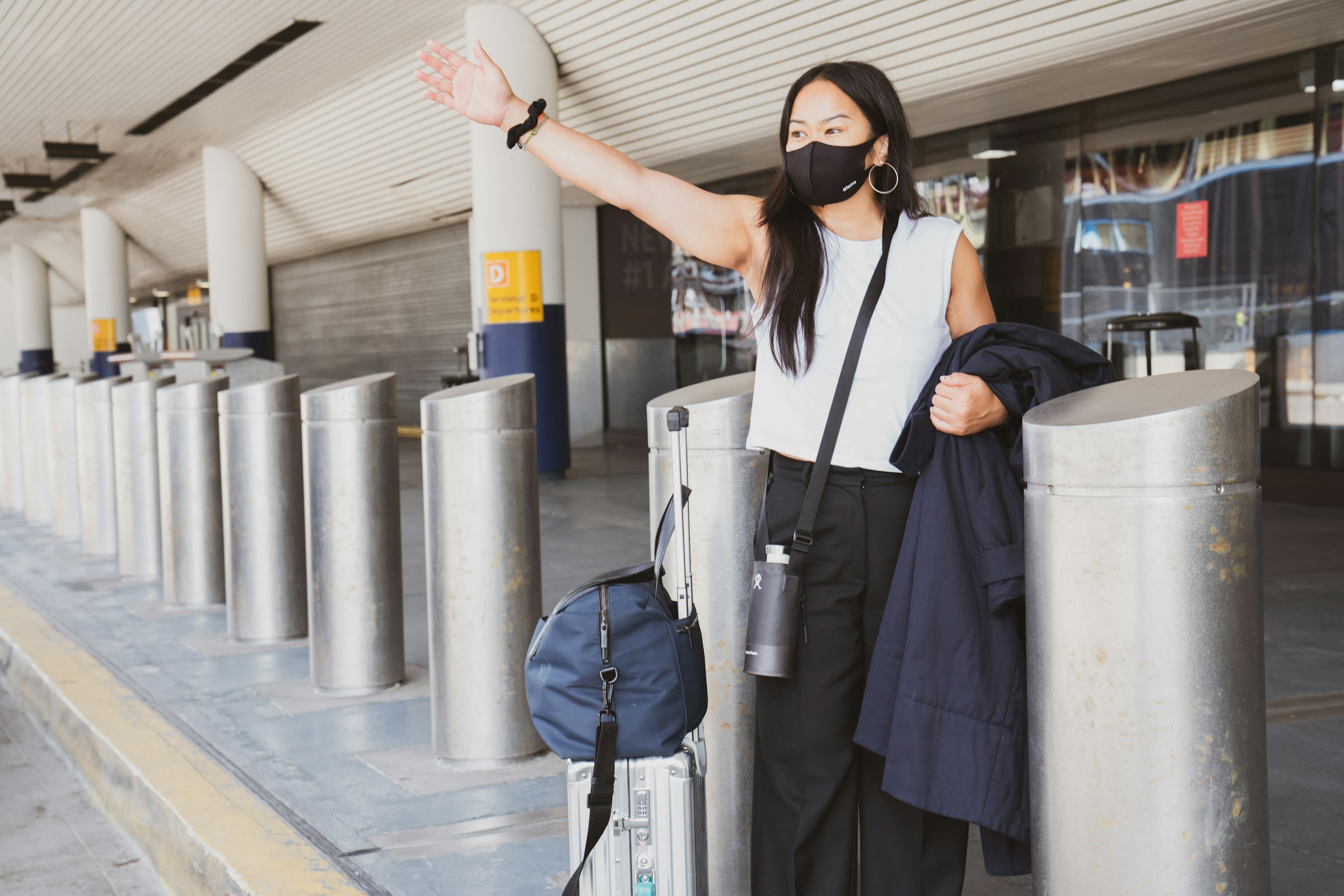 Person Holding a bag - Tips For Finding The Best Budget-Friendly Travel Deals