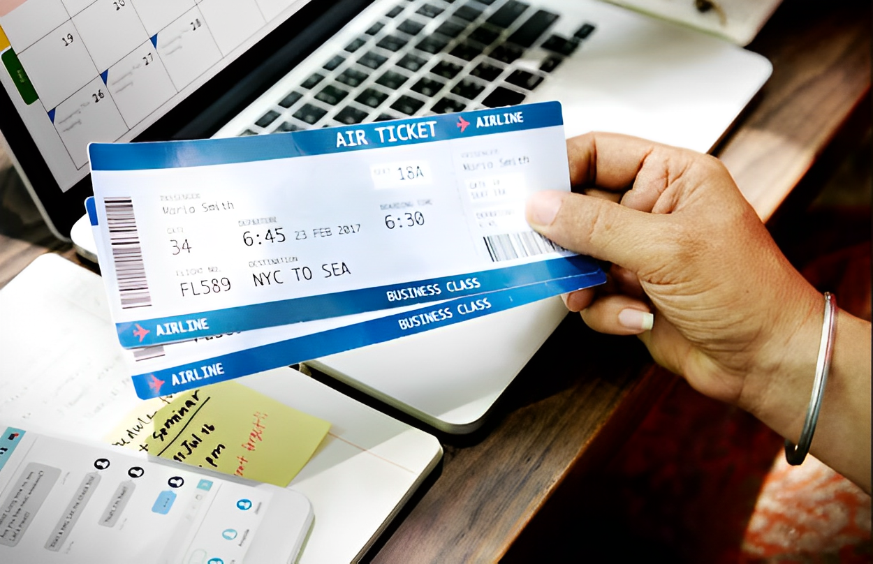 man holding airline tickets - How To Save Money On Airline Tickets
