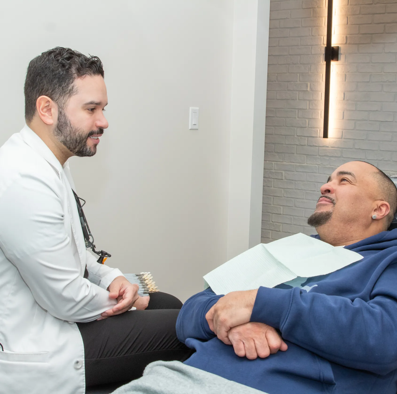 Dr. Peralta talking to patient