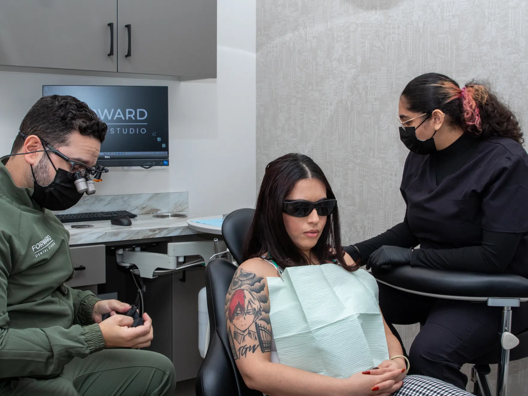 Forward Dental Studio team member and patient