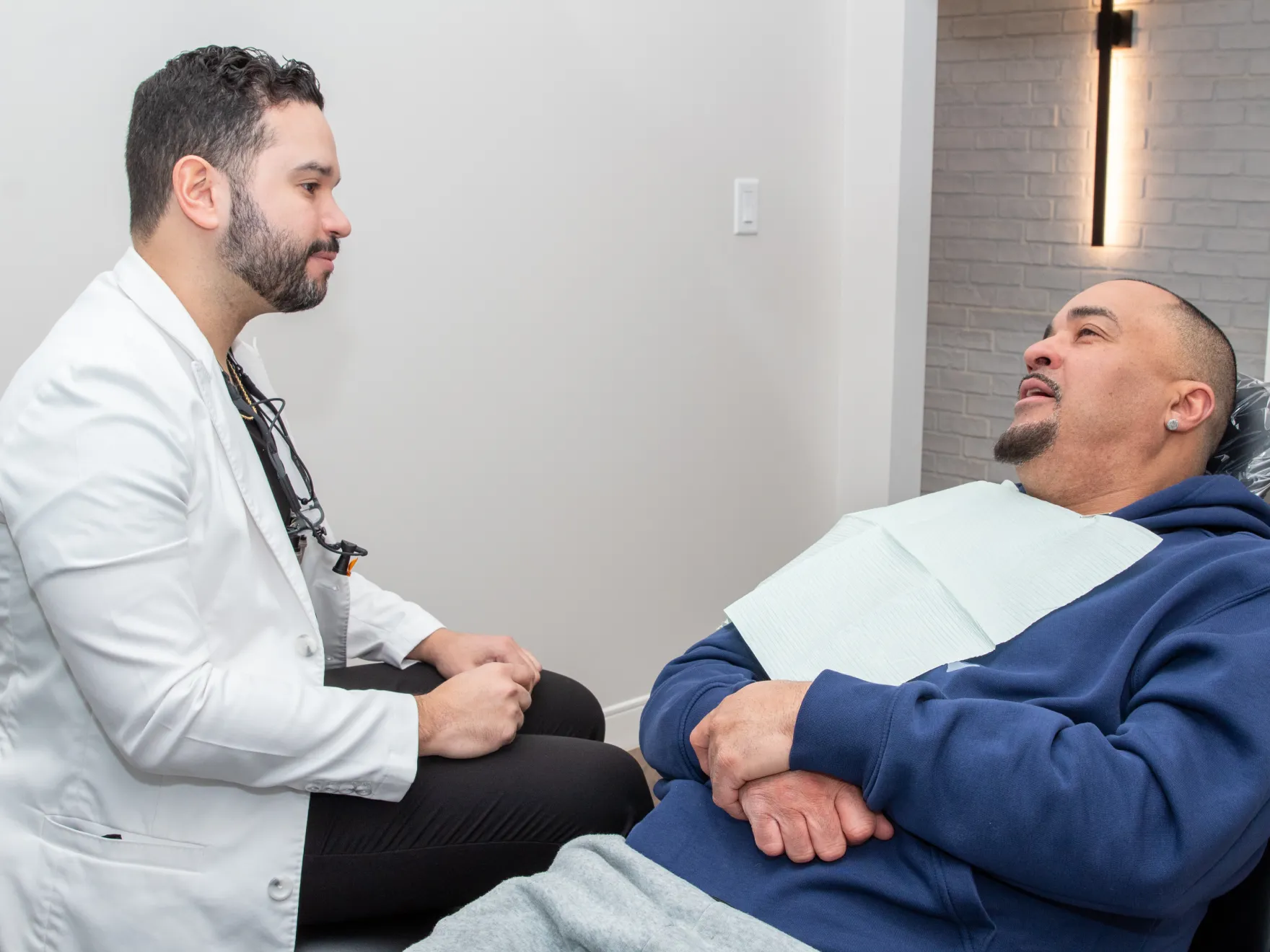 Dr. Peralta talking to patient