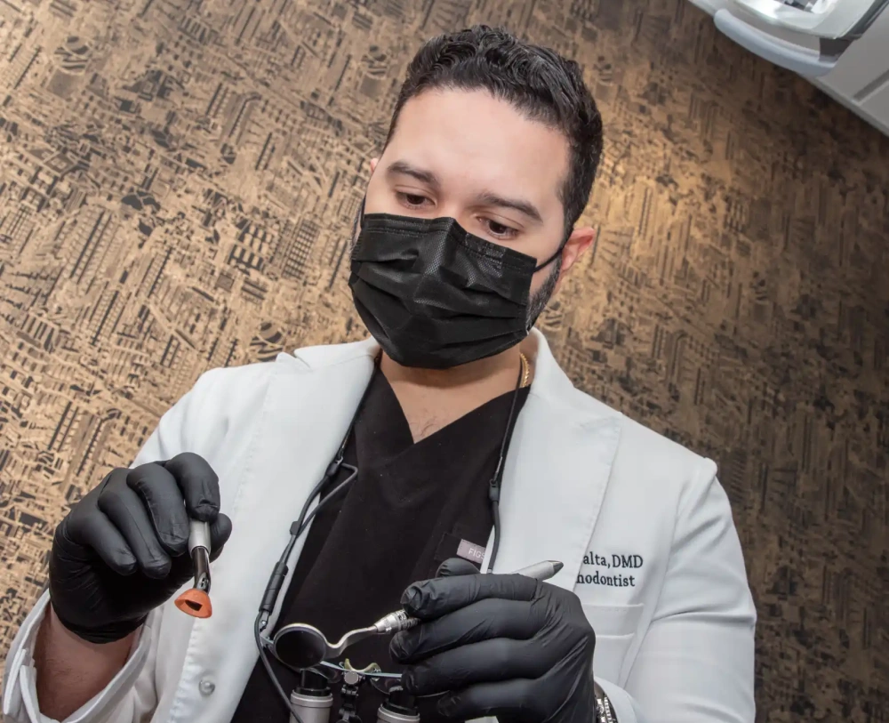 Dr Luis Peralta with a patient