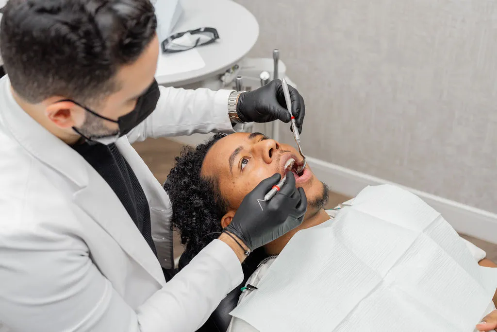 A smiling patient with the Clear correct aligner