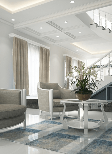 The interior of a house showing furniture and stairs