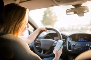 Texting while driving is a clear sign of distracted driving