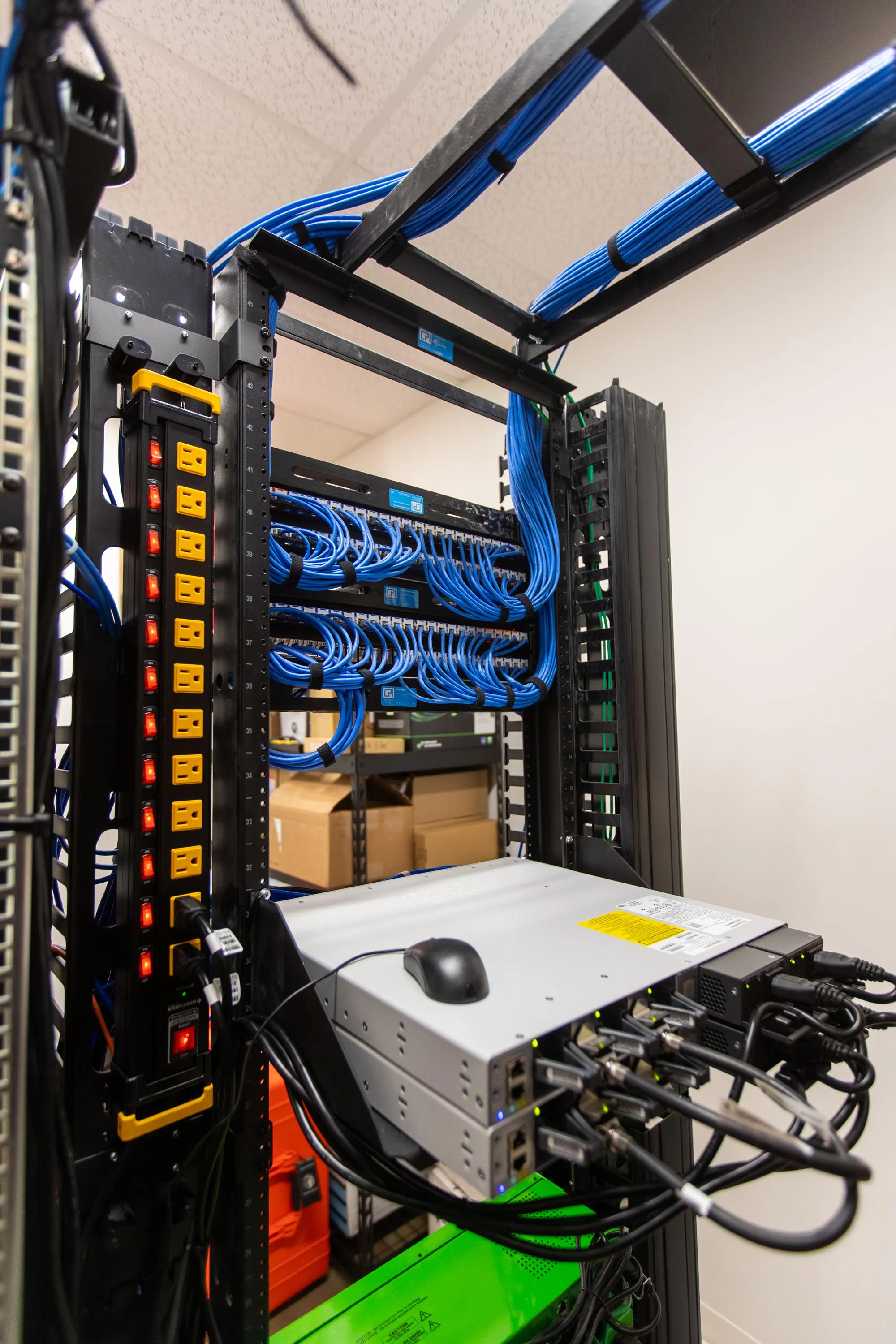 Power distribution and network equipment in a server rack