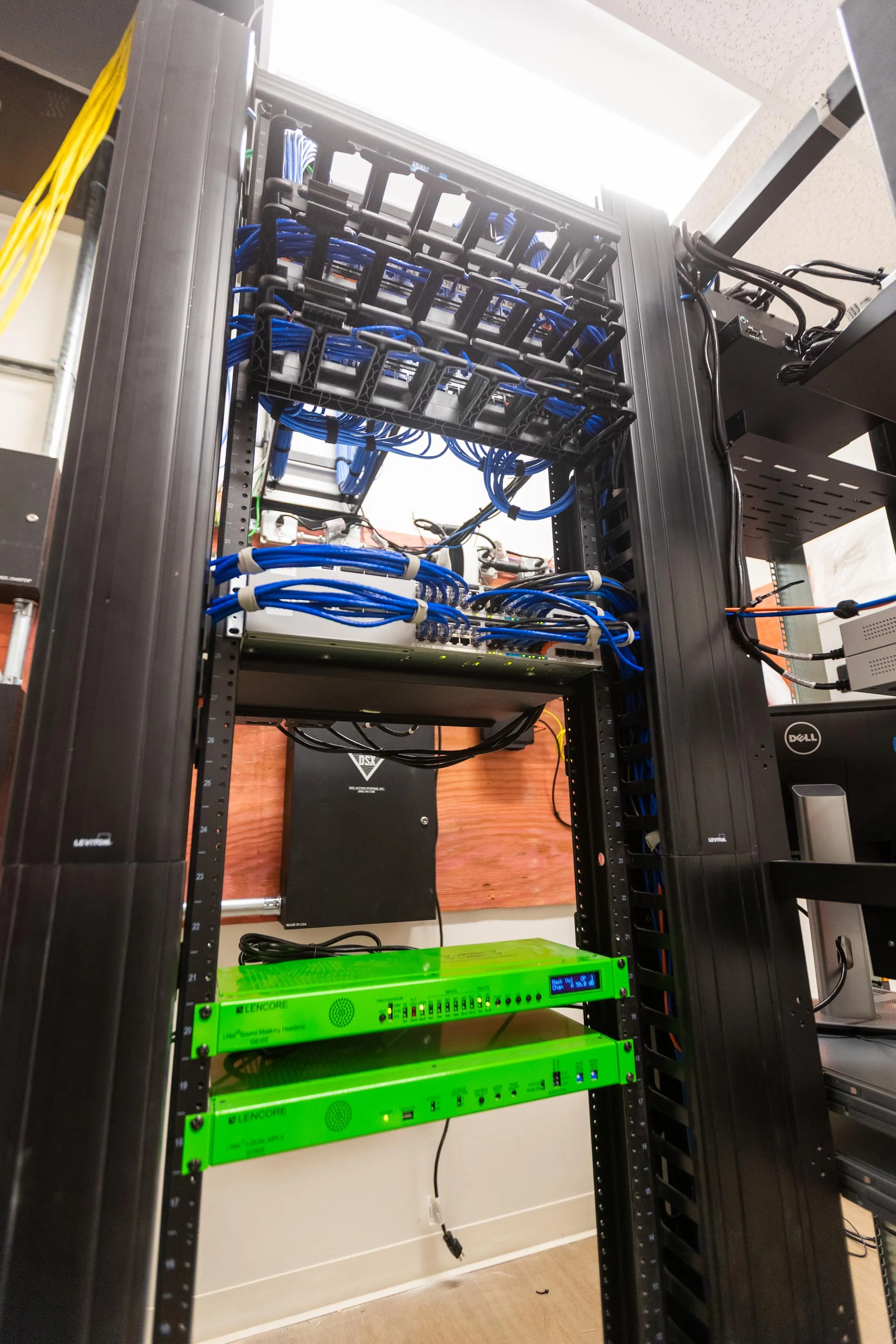 AV and sound masking equipment installed in a rack
