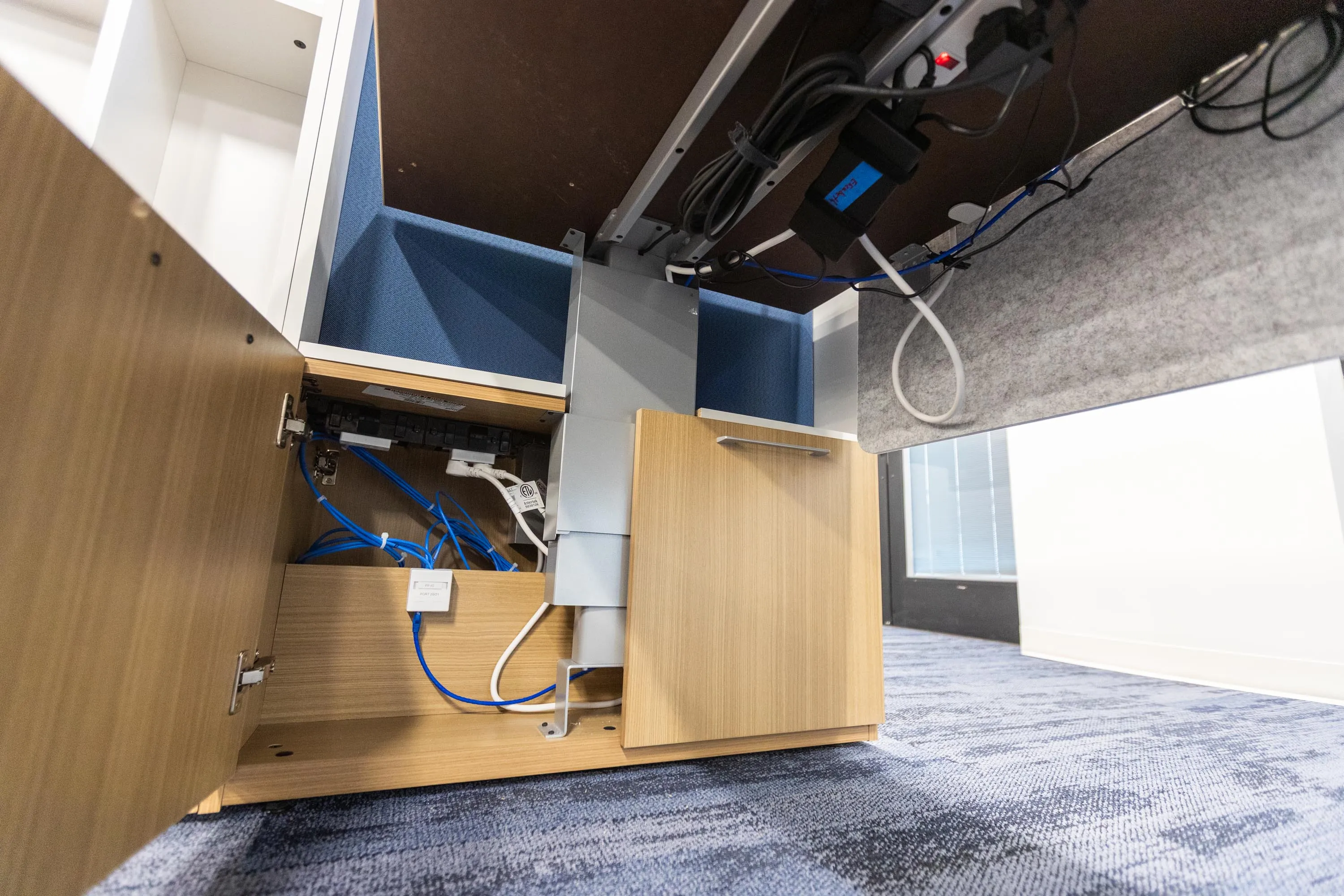 Clean under-desk data cabling installed by Avant Technologies