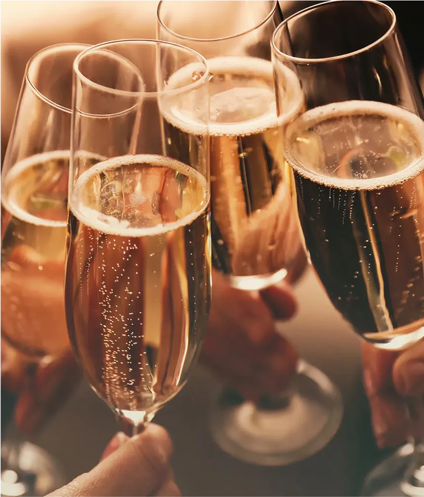 group of people toasting with champagne glasses
