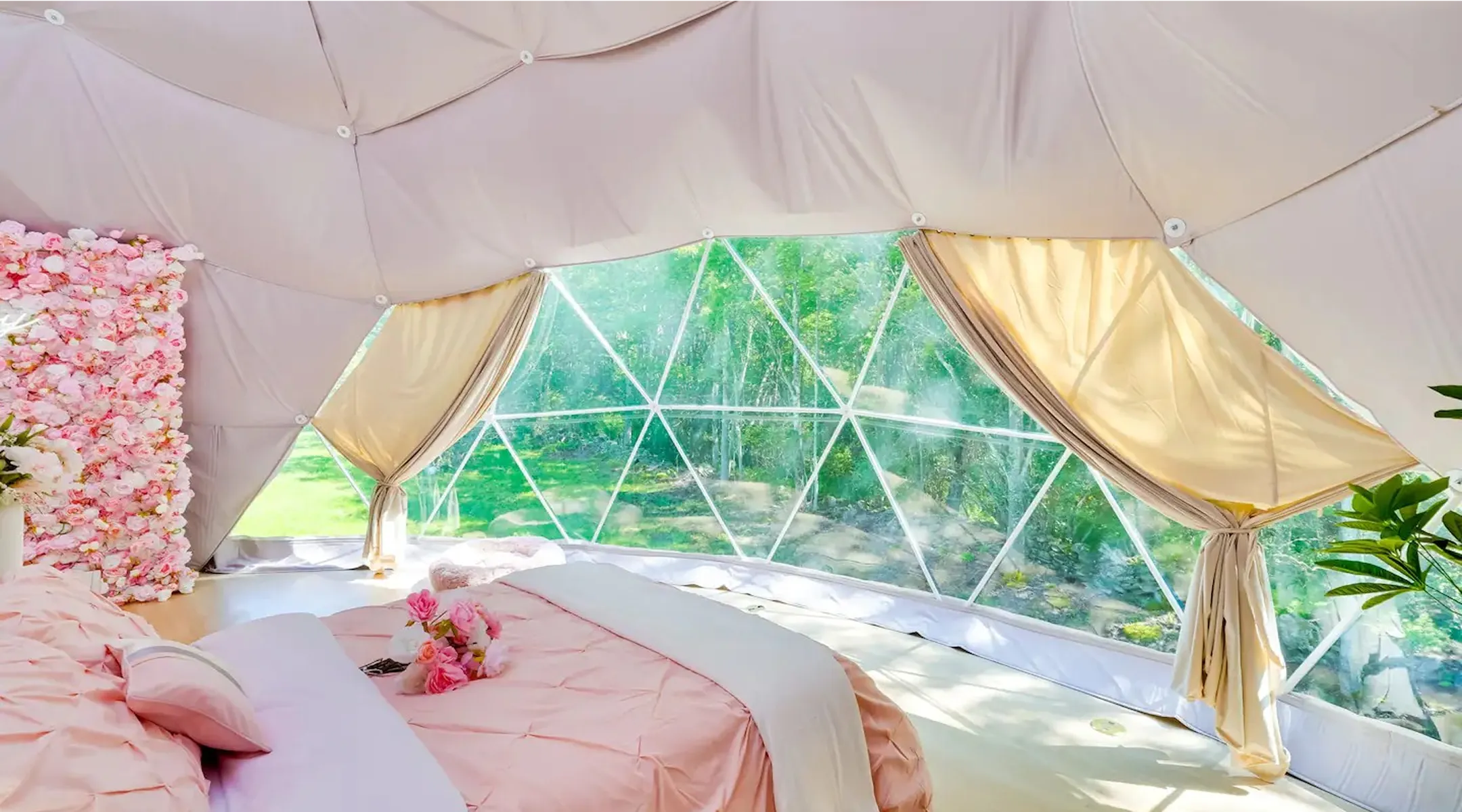 luxury dome bedroom with panoramic forest view and cozy decor at Unique Escapes NY