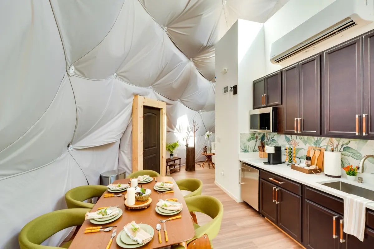 kitchen and dining space with natural light inside the dome at Unique Escapes NY