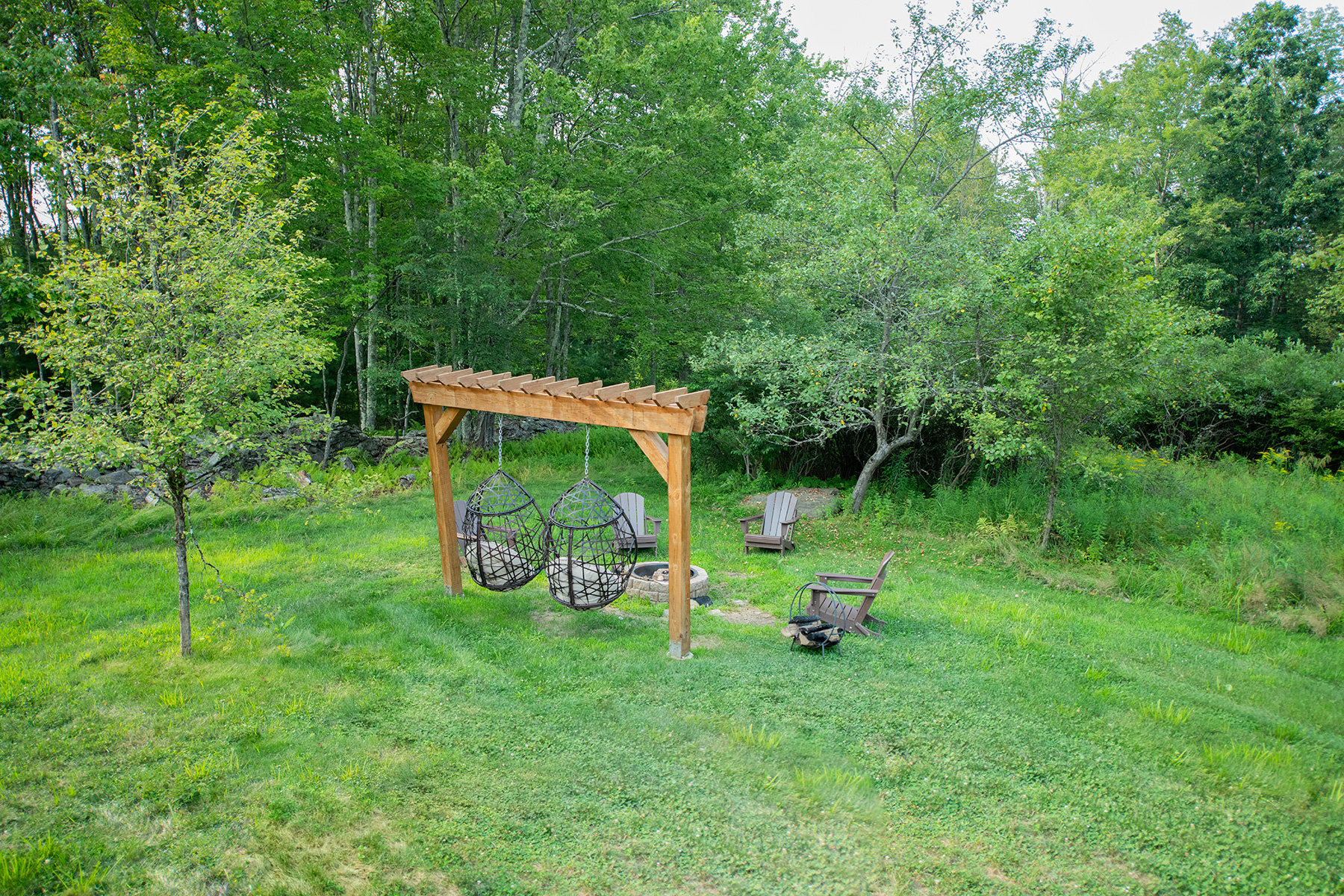 outdoor view with garden bench near the dome at Unique Escapes NY